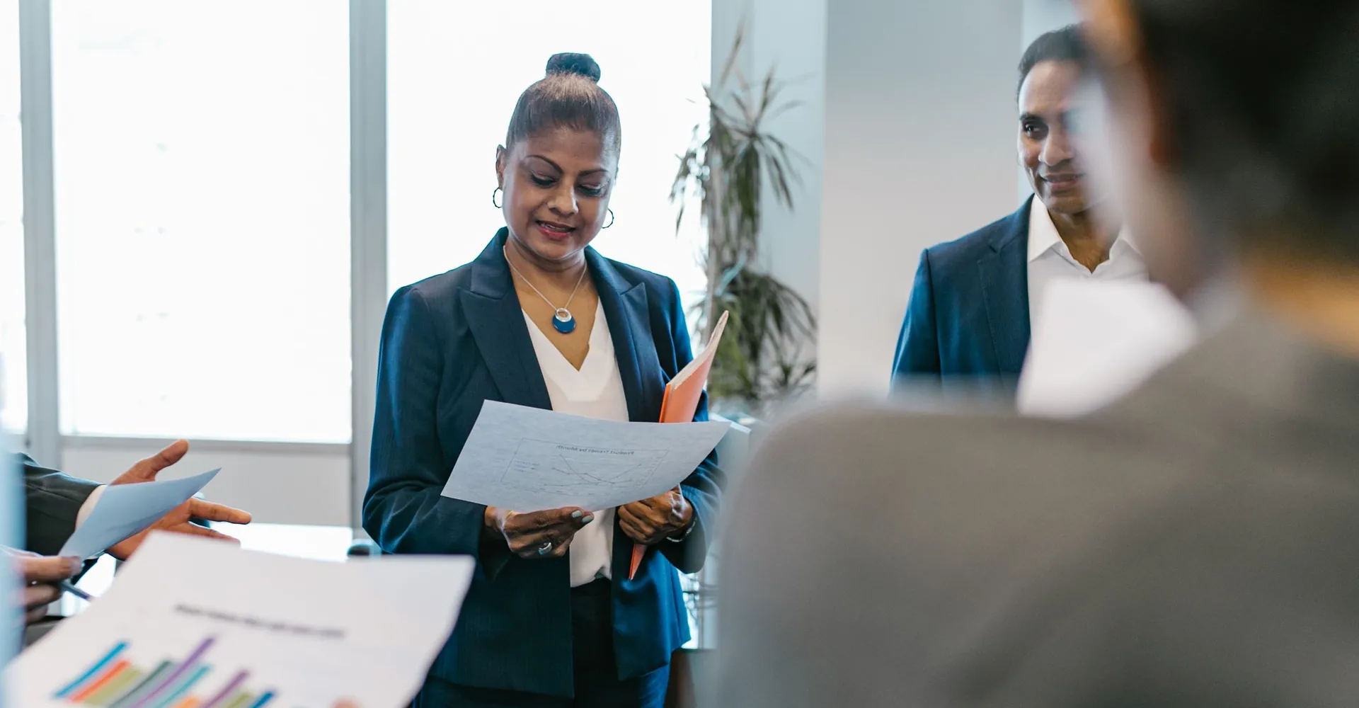 A woman entrepreneur leading a working session